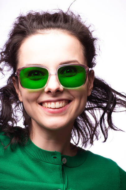 beautiful girl in green glasses and green sweater - Fotoğraf, Görsel