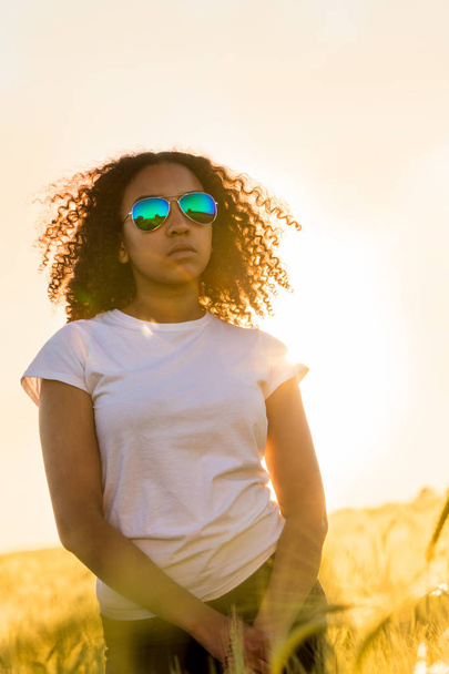 Mixed Race African American Girl Teen Sunglasses Sunset in Field - Fotoğraf, Görsel