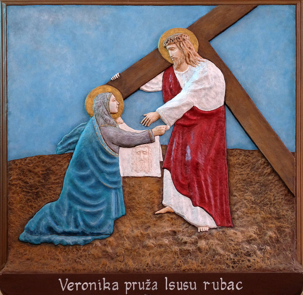 6e stations van het Kruis, Veronica veegt het gezicht van Jezus, kerk van de Onbevlekte Ontvangenis van de Maagd Maria in Malesnica, Zagreb, Kroatië - Foto, afbeelding