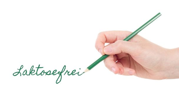 beyaz el ile yeşil kalem laktosefrei yazma - Fotoğraf, Görsel