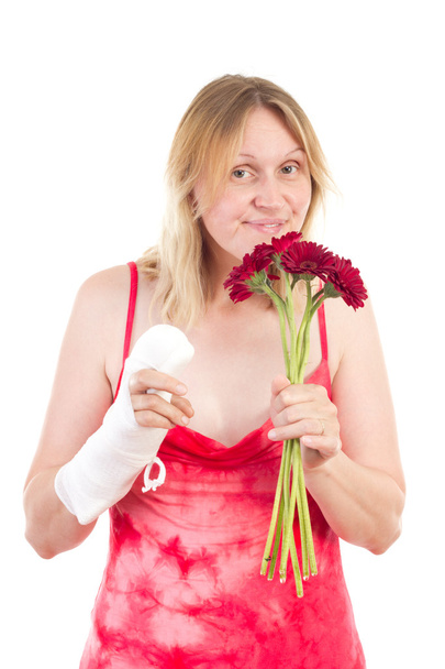 Donna con sniffi di mano bendati a fiori
 - Foto, immagini