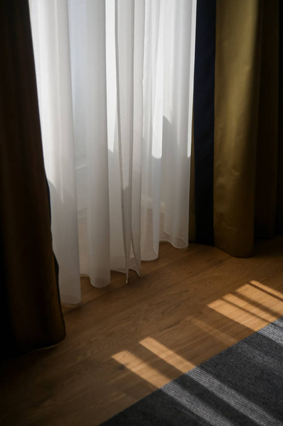 Morning sunlight through window and white curtain. - Photo, Image