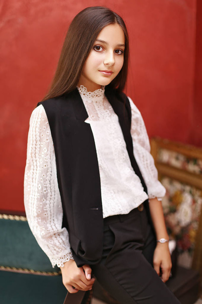 schoolgirl in fashionable clothes - Fotografie, Obrázek