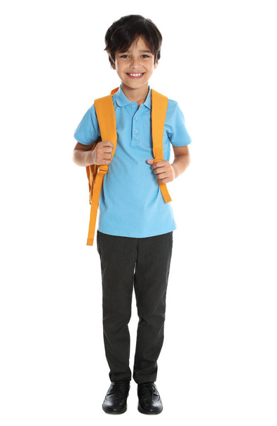 Happy boy in school uniform on white background - Φωτογραφία, εικόνα