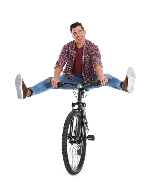 Handsome young man with modern bicycle on white background - Zdjęcie, obraz