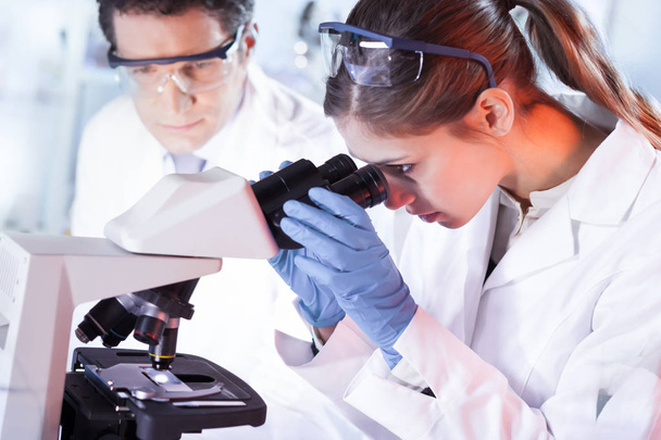 Young researchers researching in life science laboratory. - Photo, Image