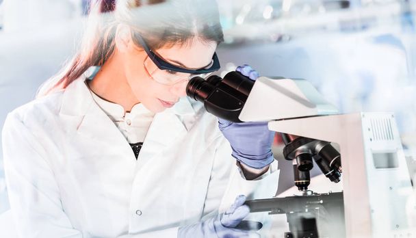 Female health care researchers working in scientific laboratory. - Photo, Image