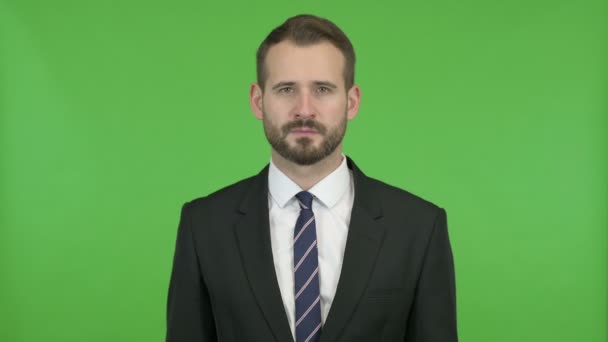 Handsome Businessman Showing off Middle Finger against Chroma Key - Footage, Video