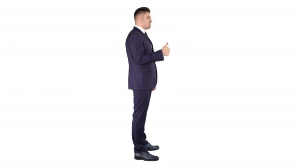 Businessman showing thumbs up on white background. - Footage, Video
