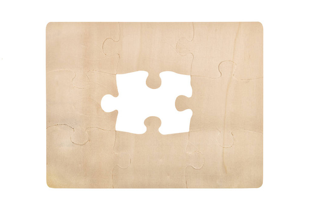 Pieces of wooden jigsaw puzzle isolated on white background. Top view. - Photo, Image