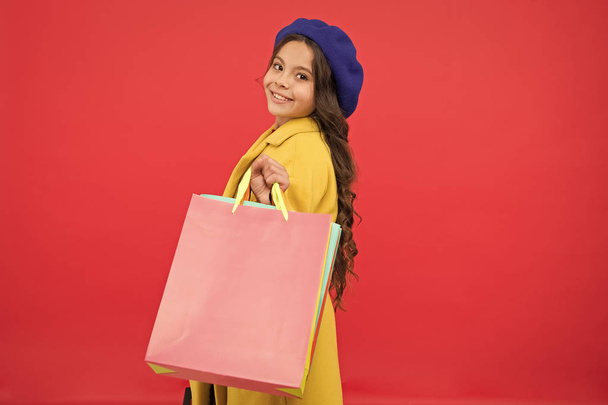 Get discount shopping on birthday holiday. Nice purchase. Fashionista enjoy shopping. Customer satisfaction. Prime time buy spring clothing. Obsessed with shopping. Girl cute kid hold shopping bags - Fotografie, Obrázek