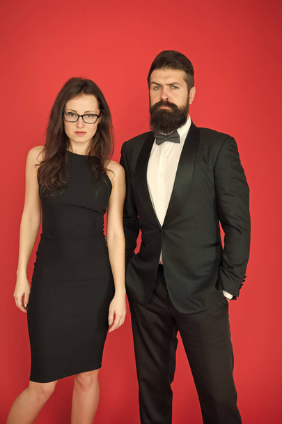 Formal couple of man in tuxedo and sexy woman. Bearded man and woman in formal dress. couple in love on date. business meeting. formal fashion look. Proposal or engagement party. Used to look perfect - Foto, Imagem