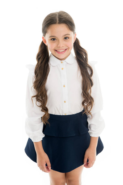 Back to school. Student little kid adores school. Pupil of first grade. Smiling schoolgirl. Celebrate knowledge day. September time to study. Girl cute pupil on white background. School uniform - Foto, Bild