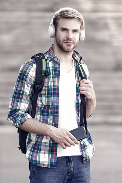 Educational technology use physical hardware software and educational theoretic. College education concept. College life. College student headphones smartphone. Online course. Audio book concept - Fotoğraf, Görsel