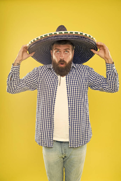 Celebrate mexican holiday. Mexican bearded guy ready to celebrate. Customs and traditions. Man wear sombrero mexican hat. Vacation travel festival and holidays. Join fest. Mexican culture concept - Valokuva, kuva