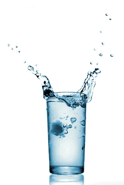 Water splash in glass isolated on white - Fotó, kép