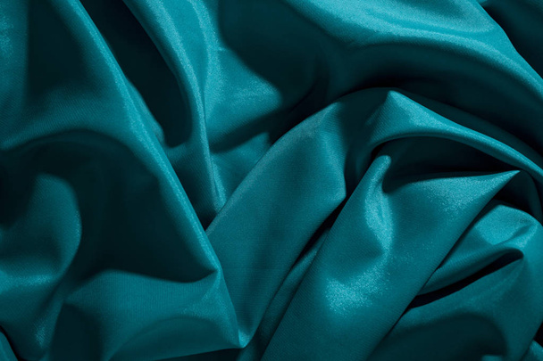 Background image of crumpled fabric. Blue silk - Fotoğraf, Görsel