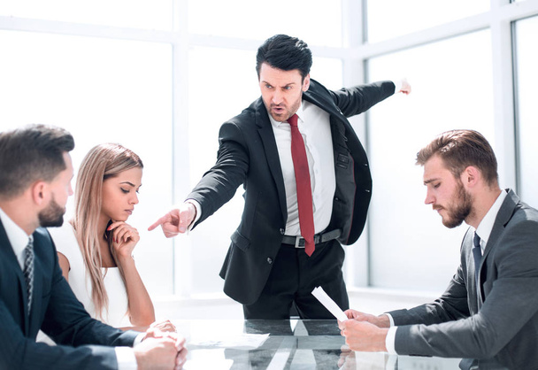 Strict boss telling upset female employee to leave meeting room - Foto, immagini