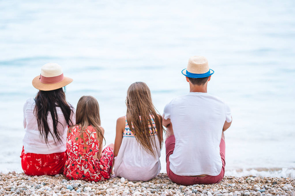 Happy beautiful family with kids on the beach - Zdjęcie, obraz