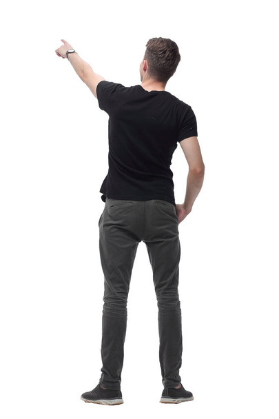 rear view. modern guy pointing at white blank screen - Foto, imagen