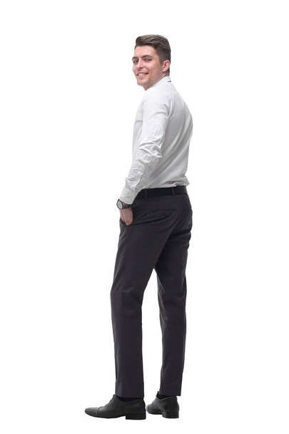 rear view.smiling young businessman looking at camera - Photo, Image