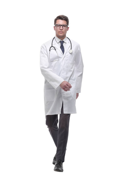 friendly doctor therapist stepping forward. isolated on white - Φωτογραφία, εικόνα