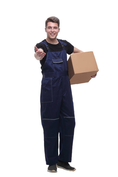 friendly worker with cardboard box. isolated on white - Zdjęcie, obraz