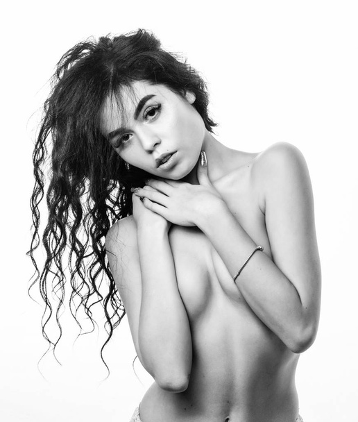 Passionate full sexual desire. Passionate girlfriend. Girl sexy nude body undressing. Woman curly hairstyle hiding breasts. Naked desirable fashion model. Sensual erotic female. Passionate striptease - Fotoğraf, Görsel
