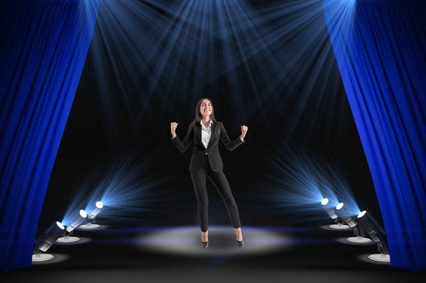 Happy businesswoman on stage - Foto, Bild