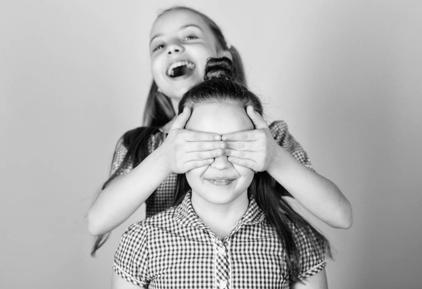 Girls sisters having fun together. Adorable sisters smiling faces. Family love. Sisterhood concept. Happy children play together. Having sister is always fun. Best friends forever. Happy childhood - Φωτογραφία, εικόνα