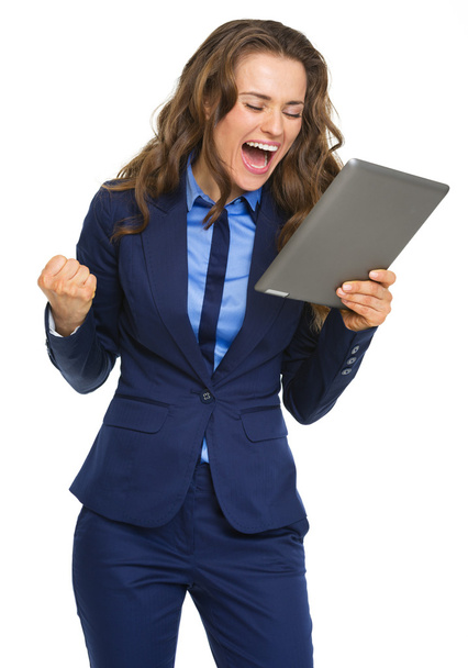 Happy business woman with tablet pc rejoicing success - Foto, immagini