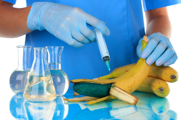 Scientists make injection into banana in laboratory - Foto, Bild