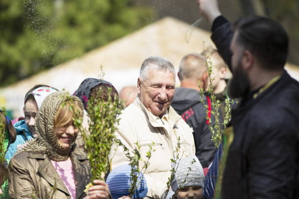 Belarus, Gomel, April 21, 2019. Palm Sunday is a church holiday.Believers with bouquets of spring willows on a religious holiday - Photo, Image