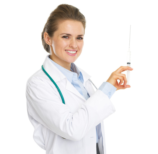 注射器と笑みを浮かべて医師の女性 - 写真・画像