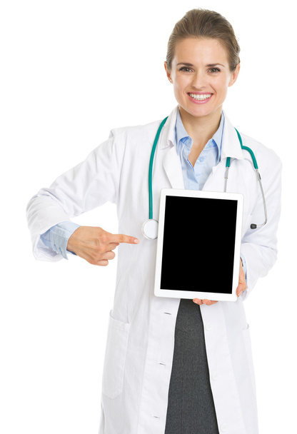 Smiling doctor woman pointing on tablet pc - Fotoğraf, Görsel