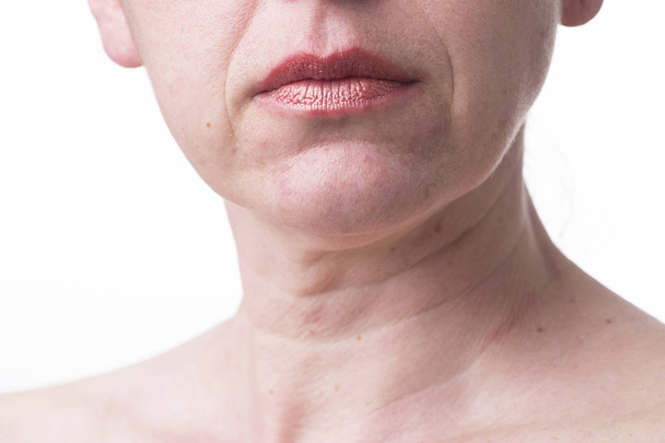 Furrowed lips of a mature woman.Signs of aging skin after 40 - 写真・画像