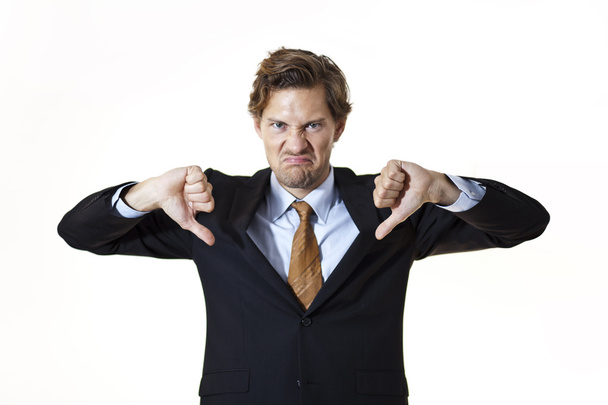 Unhappy businessman giving thumbs down - Foto, Imagem