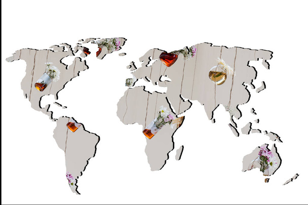Roughly outlined world map with herbal tea - Photo, Image
