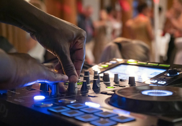 dj club dance party background with sound mixer console - Fotografie, Obrázek
