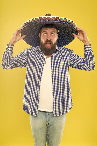 Perfect for sun protection. Traditional fashion accessory for theme costume party. Hipster in wide brim hat. Mexican man wearing sombrero. Bearded man in mexican hat. He is in love with mexican style - Foto, Imagem