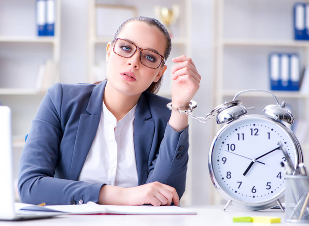 Businesswoman in time management concept - Photo, Image