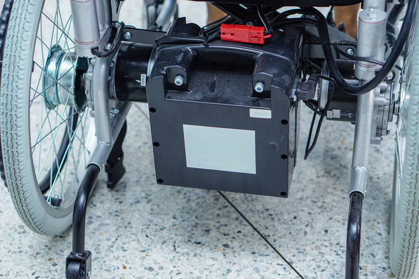 Battery of electric wheelchair for patient or disable people. - Zdjęcie, obraz