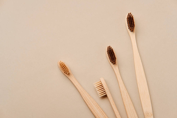 Wooden Toothbrush Isolated on Beige Background Copy Space - Fotografie, Obrázek
