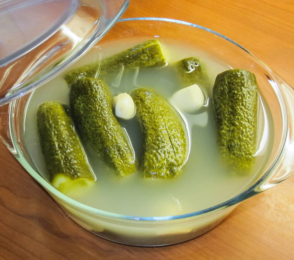 Marinated pickled cucumbers in bowl - Photo, Image
