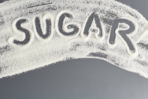 Background of sugar with the word sugar - Fotoğraf, Görsel