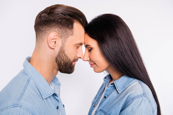 Profile side photo of charming people with their eyes closed wearing denim jeans shirt isolated over white background - Φωτογραφία, εικόνα