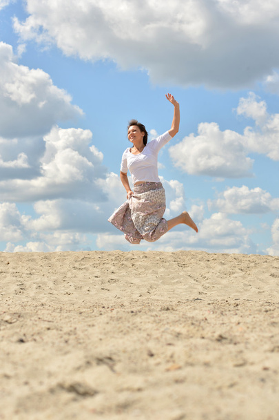 Happy woman jumping - Фото, зображення