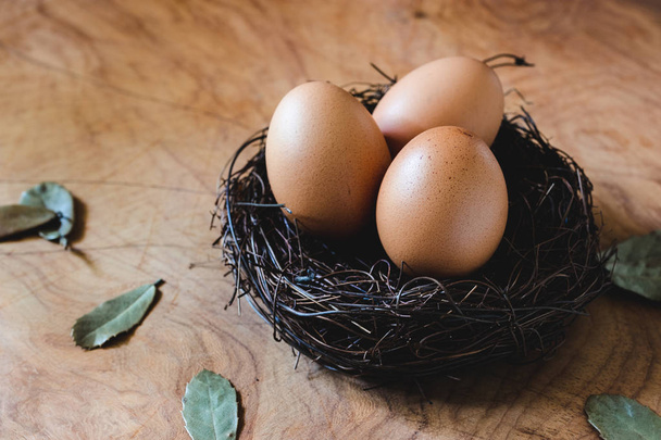 Fresh egg on wooden background. - Foto, Bild