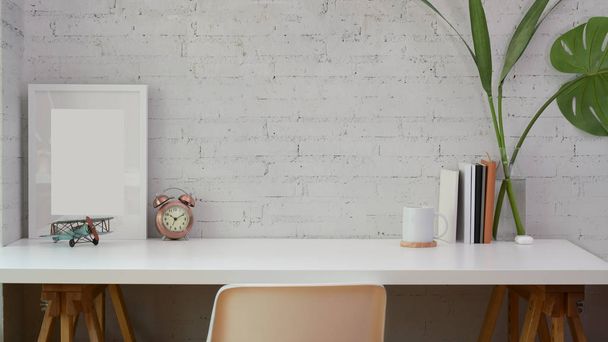 Minimal workplace with copy space and mock up frame  - Photo, Image