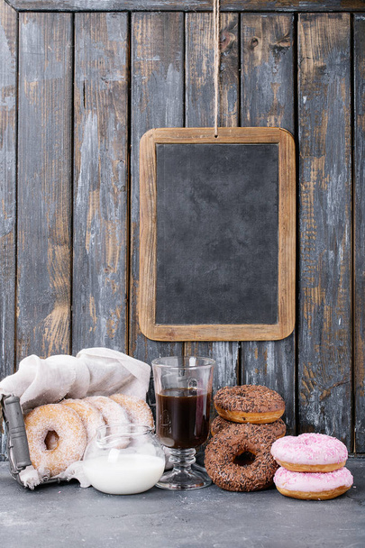 Sweet donuts with coffee - Fotó, kép
